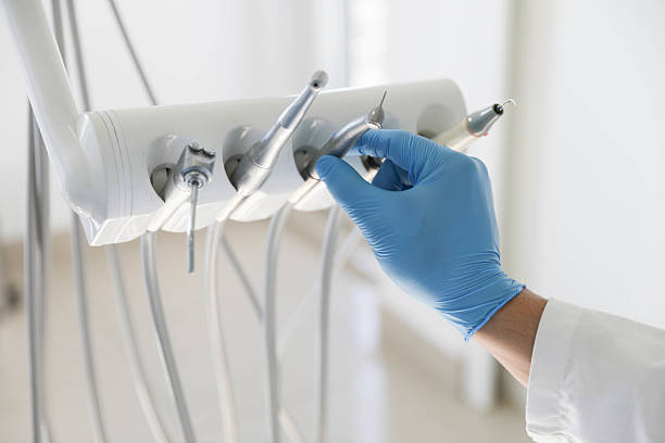 Professional Tooth Extraction technician working in Nevada County County, AR